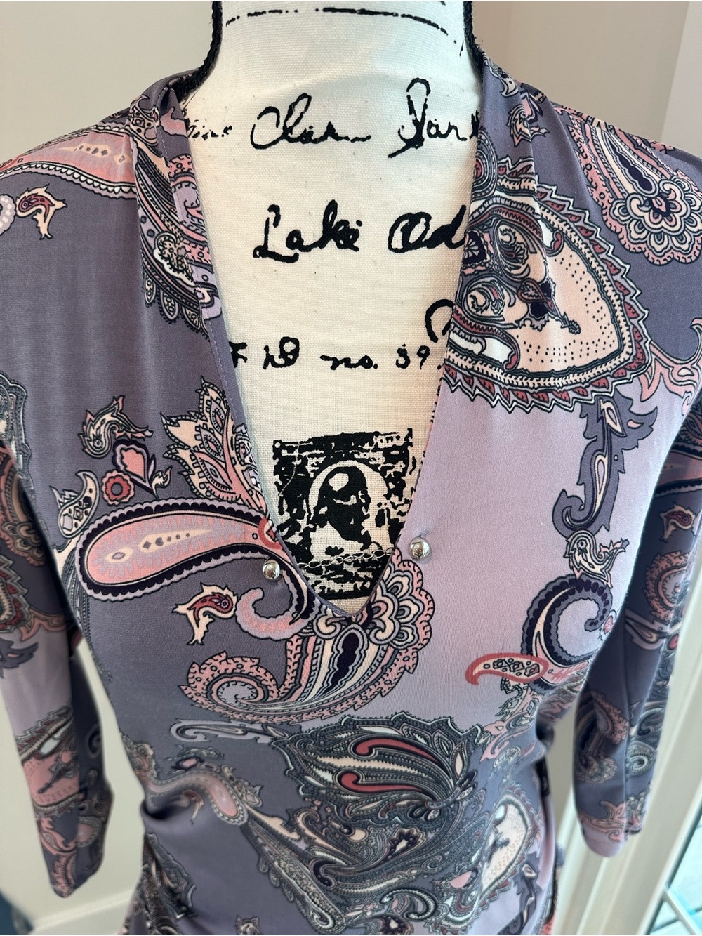 Lavender & Pink paisley patter roched  sides size small with lots of stretch.
